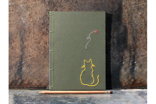 Yellow Cat Watching A Butterfly Journal by Fabulous Cat Papers