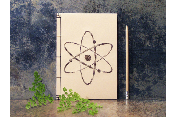 Atom Symbol Notebook by Fabulous Cat Papers