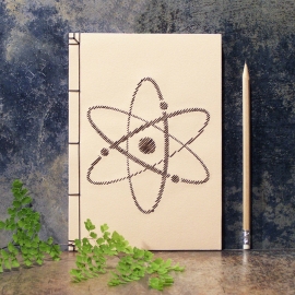 Atom Symbol Notebook. Ivory Atom Symbol Notebook by Fabulous Cat Papers